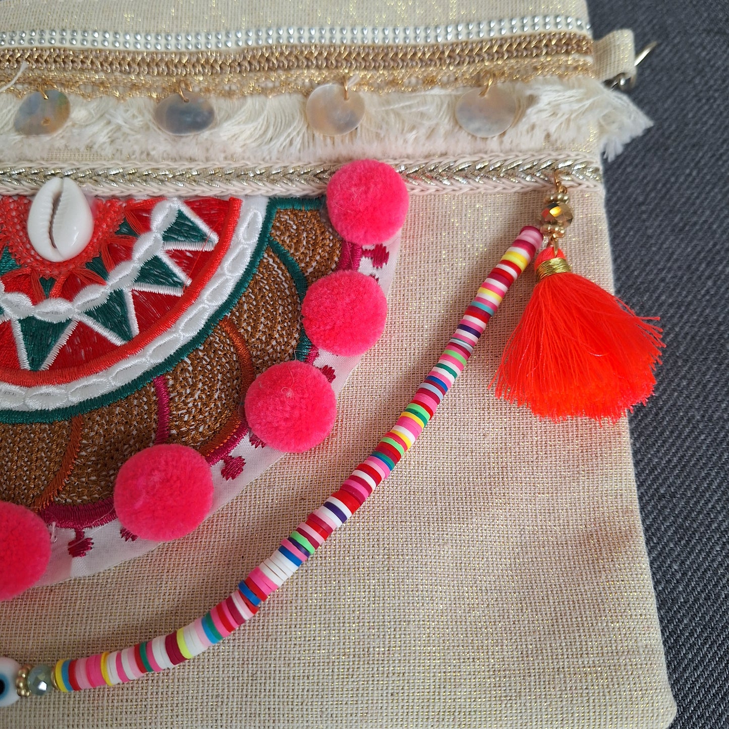 Larah Pom Pom Clutch