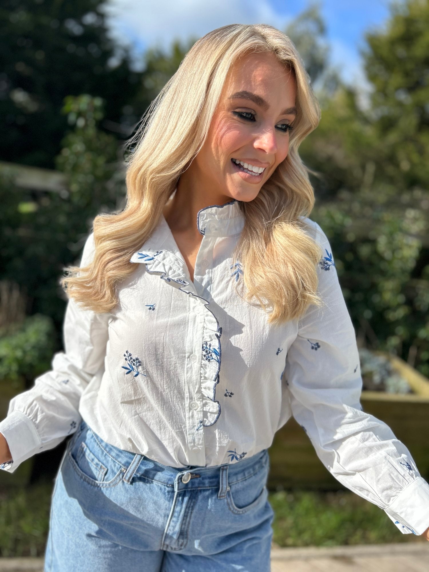  Sandy white shirt blue embroidery - Image unknown